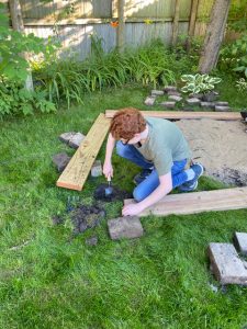 William prepares to lay the foundation for his “thinking place.”]